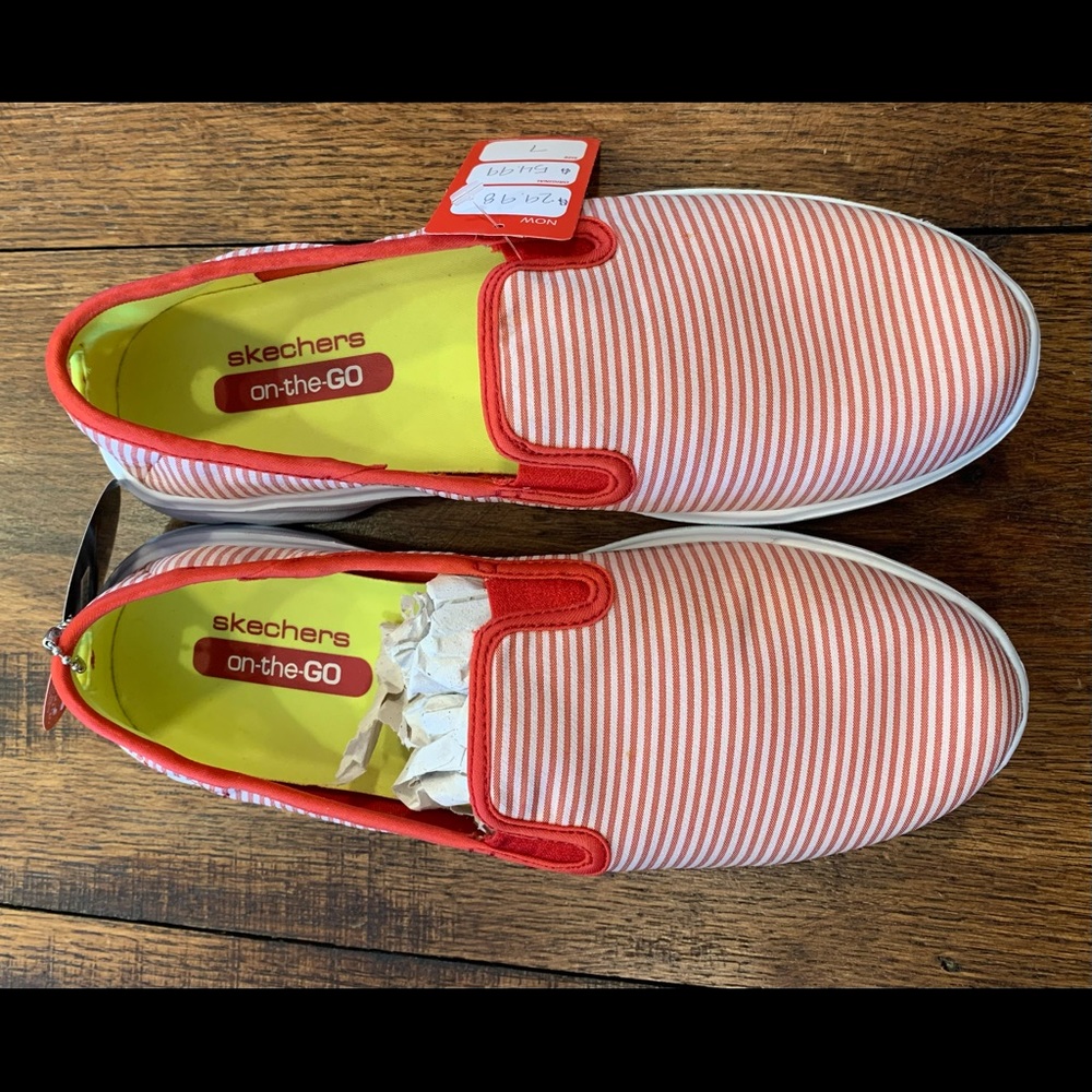 Sketchers on-the-go red and white shoes